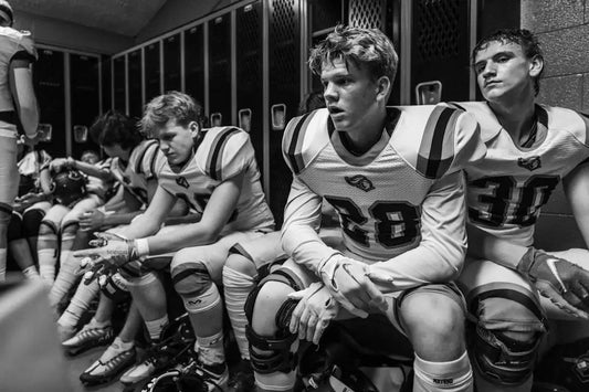 White and black striped football jersey numbered 28, enhancing sports psychology insights